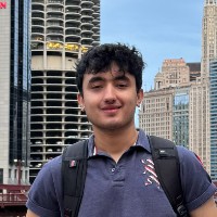 Atif's Headshot in a city